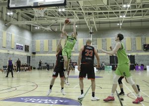 Dan Bowler rises highest to score over Ciaran O'Sullivan