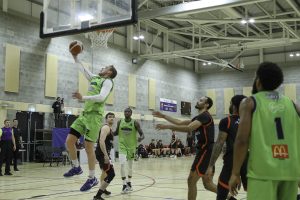 Daniel Jokubaitis hooks in a layup