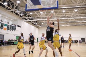 Eoin Quigley gets past Jaylyn Richardson to score from close range