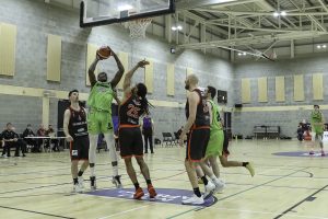 Iggy Hunte with a tough finish over Latavious Mitchell