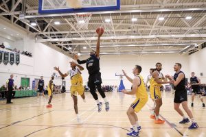 Jordan Perkins with a left handed lay up