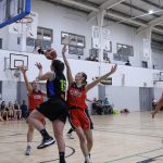 Meábh Barry scores despite the efforts of Emma Kerin