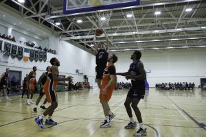 Dan Bowler finishes over Baptiste Chazelas