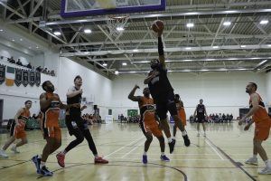 Jordan Perkins finished of a length of the court basket