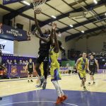 Iggy Hunte scores over Zach Hinton