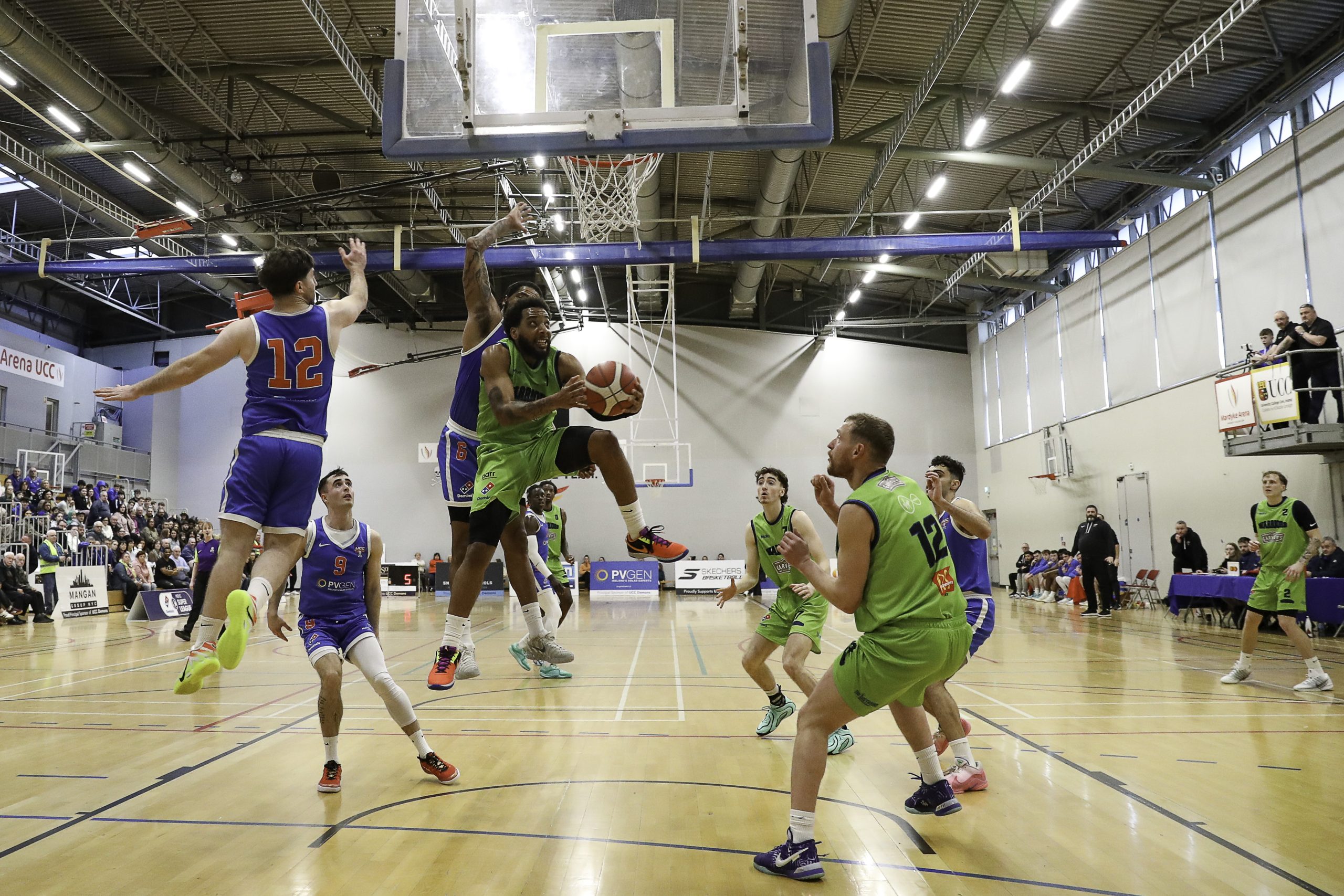 Jordan Perkins in a tight spot under the Demons board