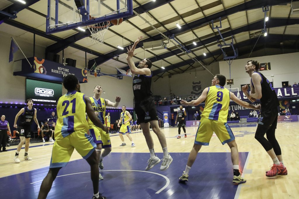 Warriors captain Eoin Quigley tips in