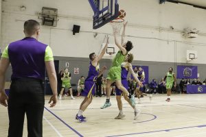 Dan Bowler goes highest to the ring over Saints Charlie Coombes