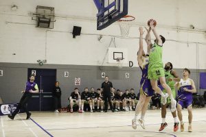 Eoin Quigley powerfully dunks over Eoin McCann