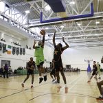 Jordan Perkins lays up over Sligo's Olu Toluogunkoya