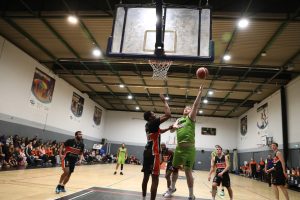 Oisin Kerlin hooks in a score just before half time