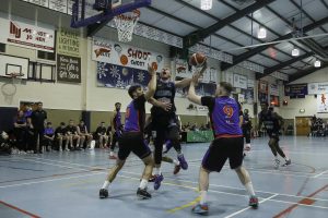 Daniel Jokubaitis hooks in a basket over Stefan Desnica