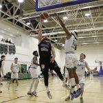 Daniel Jokubaitis rises high to shoot over Abdul Wurie