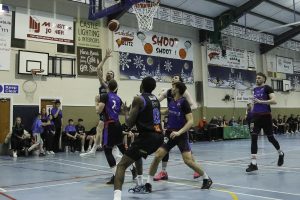 Eoin Quigley banks ina score for Warriors