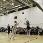 Eoin Quigley fires in from beyond the arc despite the efforts of Eoin Evans