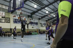 Iggy Hunte lays up a basket