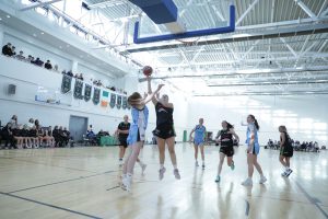 Aimee Turner scores over Emily Smyth