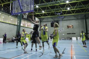 Daniel Jokubaitis defiantly scores as the Marian defence look on