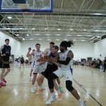 Daniel Jokubaitis outnumbered by the Belfast defence