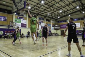Daniel Jokubaitis tips in a basket for Warriors